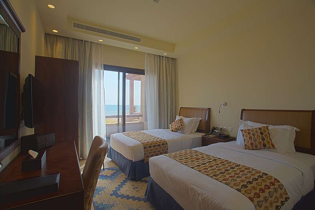 Golden Tulip Sharma Resort Quarto foto