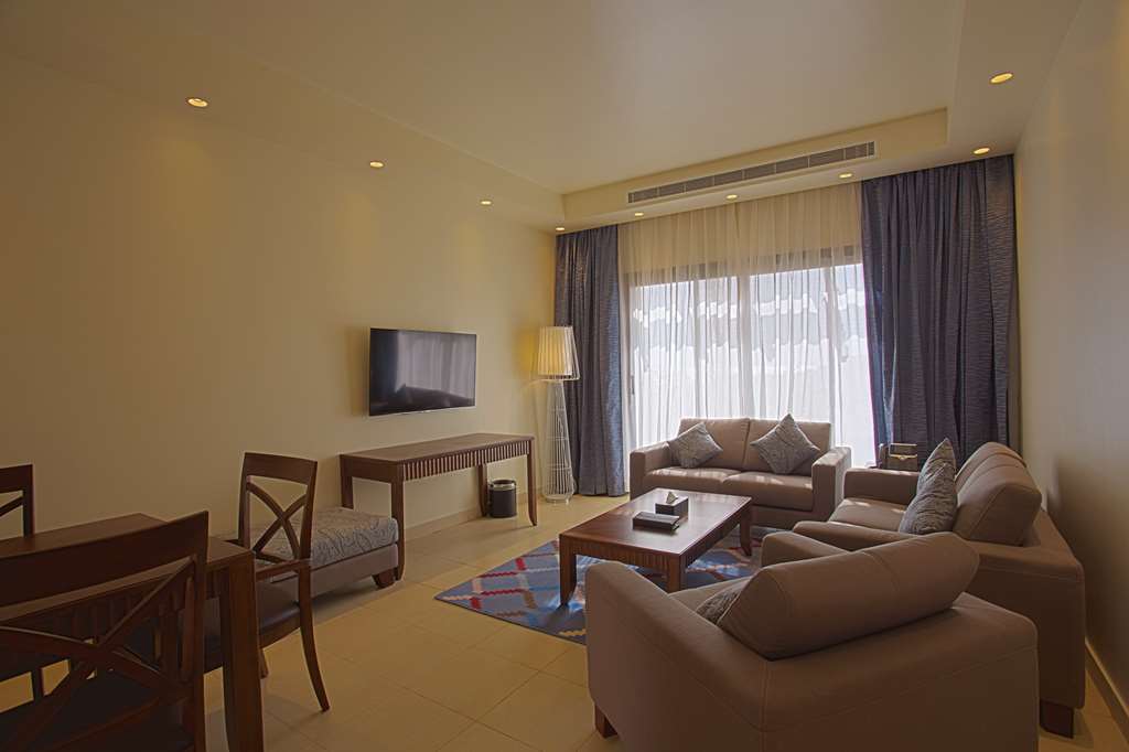 Golden Tulip Sharma Resort Quarto foto
