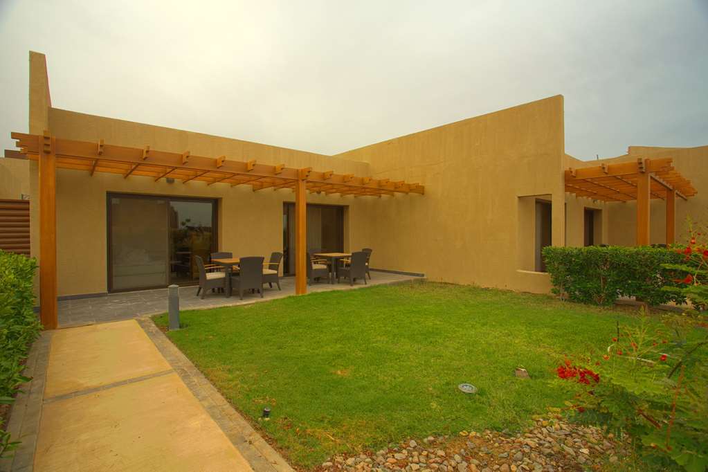 Golden Tulip Sharma Resort Quarto foto